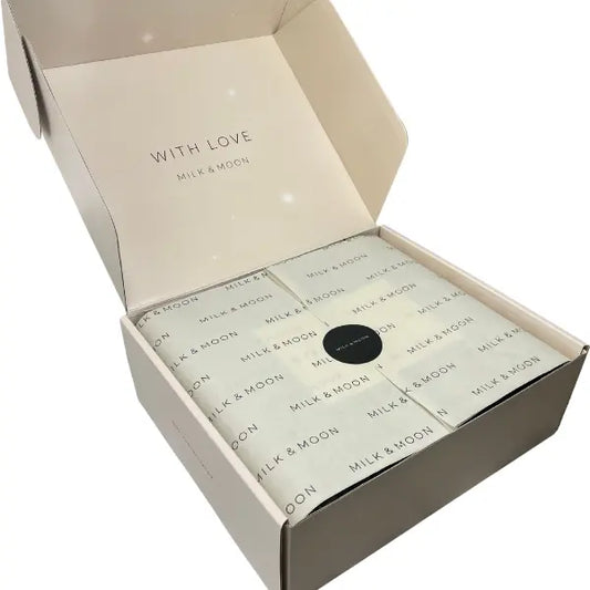 Milk & Moon branded box with monogramed paper and sticker | send a gift of thoughtful care with love