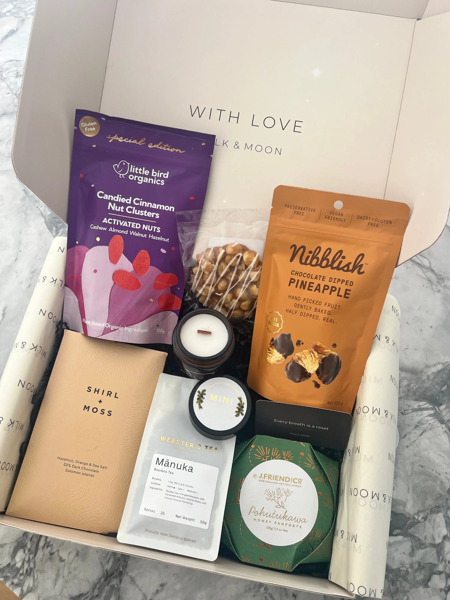 Thoughtful self care foodie gift box with sweet artisan treats from NZ. Gift wellness can be fun and delicious.