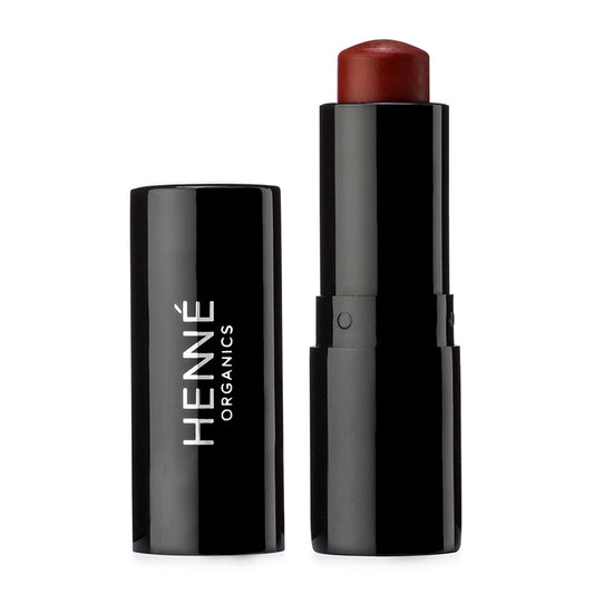 Black lipstick with red shade and 'HENNE ORGANICS' branding on a white background