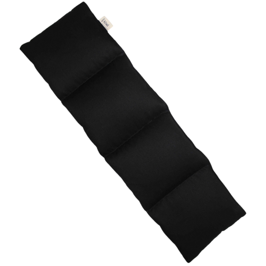 Black fabric roll on a white background