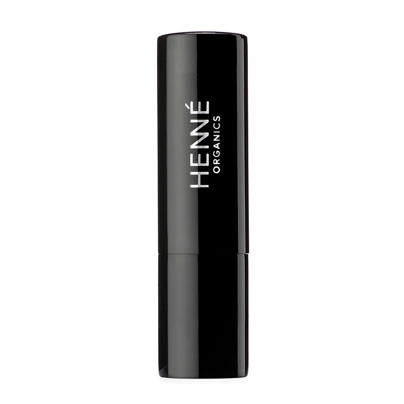 Black lipstick with 'HENNE ORGANICS' branding on a white background