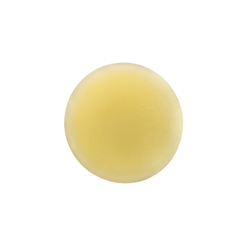 Yellow stress ball on a white background